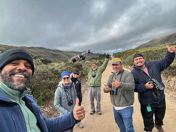 Here's everyone celebrating after Steve "got the shot" of the Green-bearded Helmetcrest! Our driver and our local guide (from Bogota) are on the right.