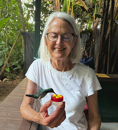 In the Savagre area we visited the home of an artist called Cope whose yard had lots of friendly hummingbirds. (There's sugarwater in the little feeder I'm holding.)